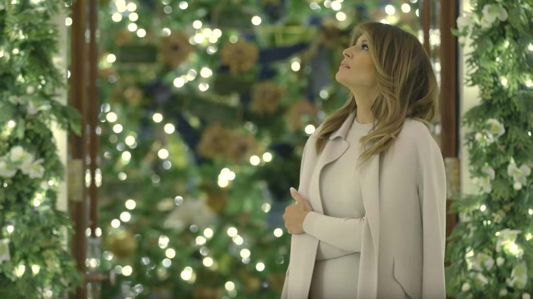 Bah, Humbug! The Media Has a Meltdown as Melania Trump Wears a Coat Indoors While Looking at Her Christmas Decorations