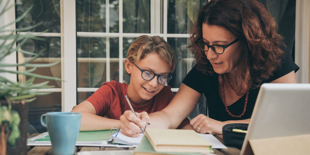 Mother and son doing homework