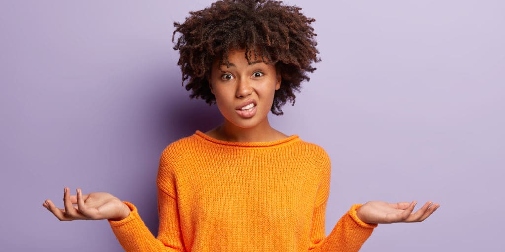 A woman with a confused look on her face