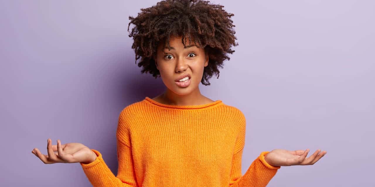 A woman with a confused look on her face