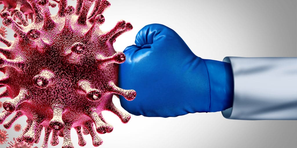 A fist punching Coronavirus