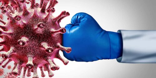 A fist punching Coronavirus