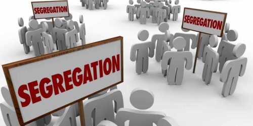 People icons holding "segregation" signs
