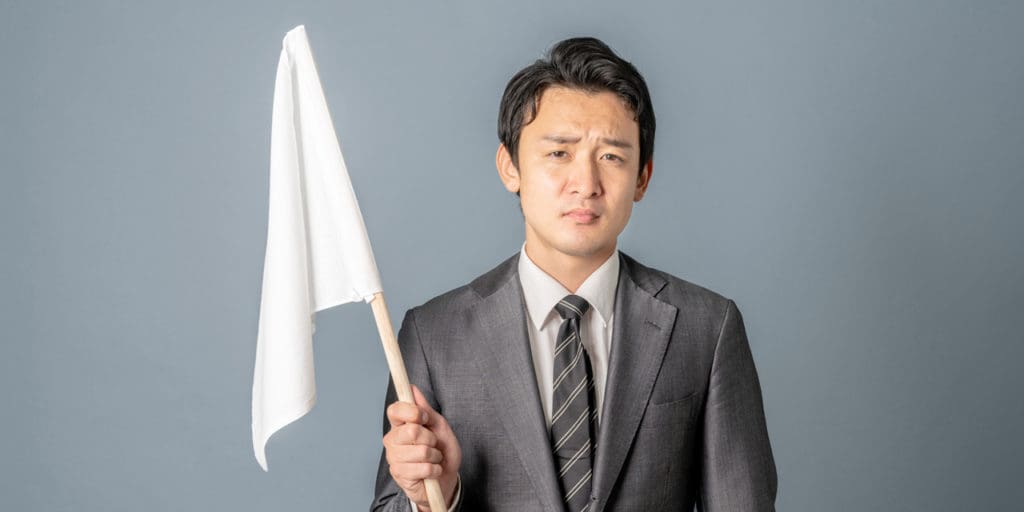 Man holding white flag