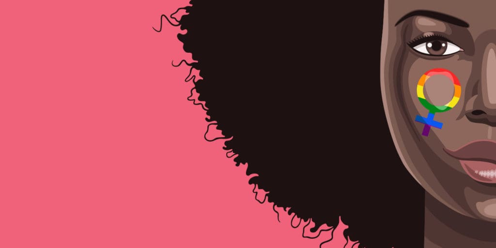 Woman with LGBT pride colors on her face