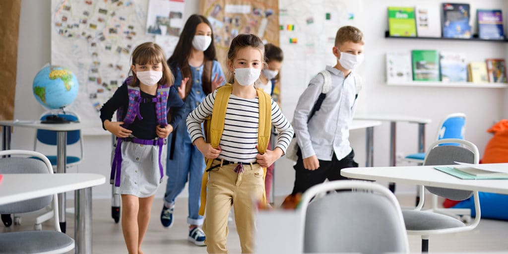 School aged children going to class