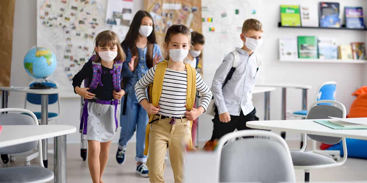 School aged children going to class