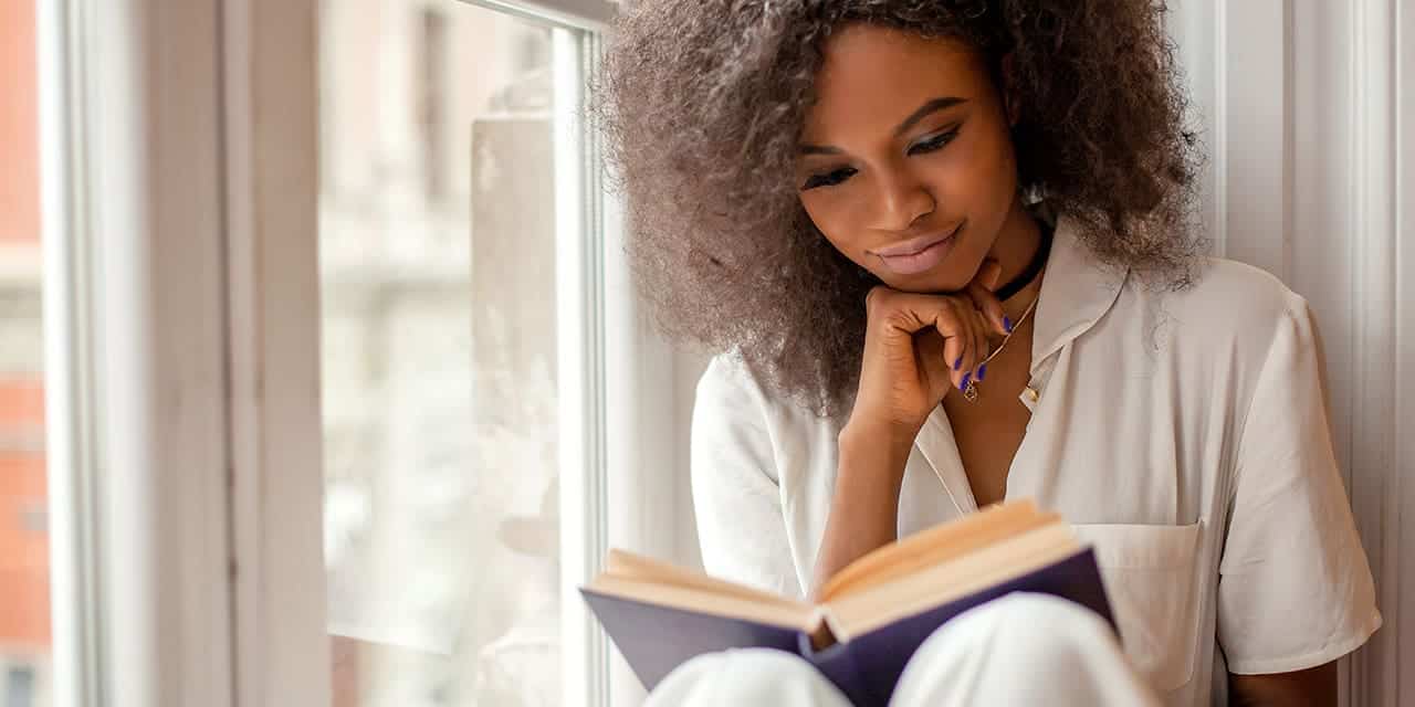Woman reading a book|Empty Planet: The Shock of Global Population Decline|Them Before Us