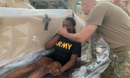 Seven U.S. Army Members Baptized in Makeshift Tractor Baptismal