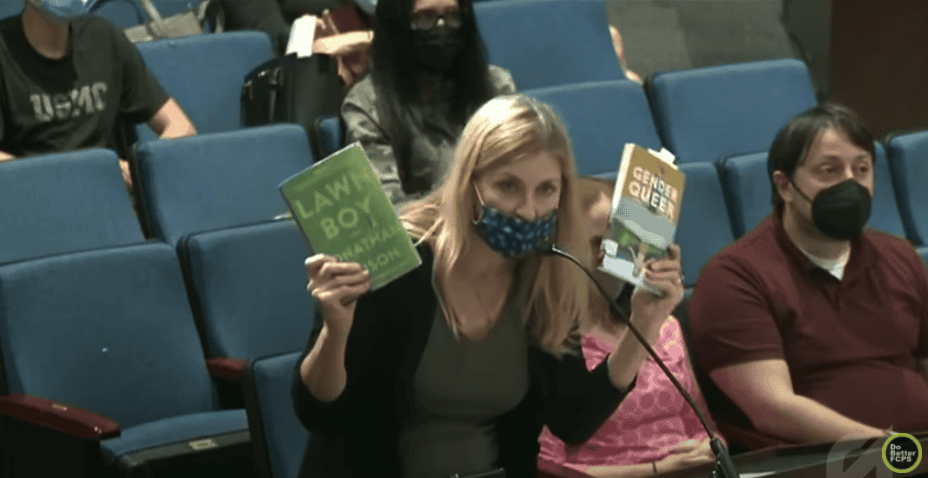 Mom Holding Up Books