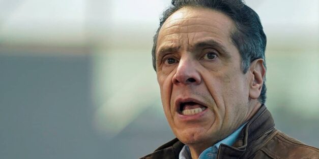 Andrew Cuomo|Hands in chains