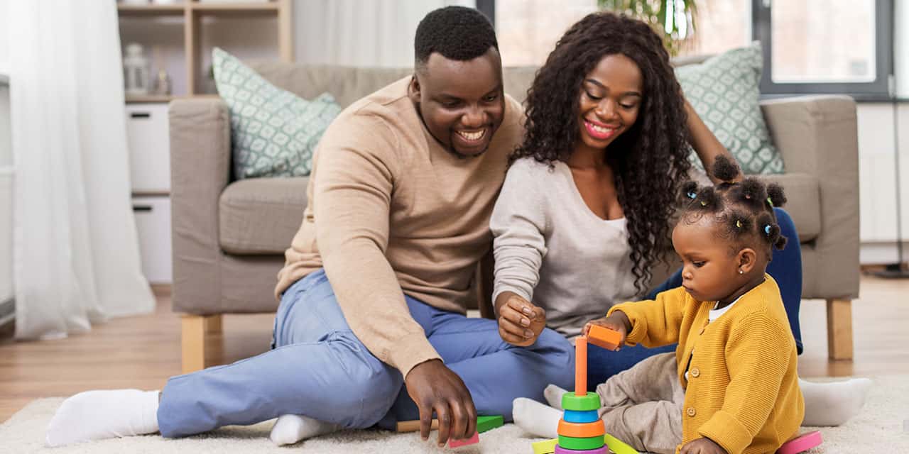 Family playing in the living room